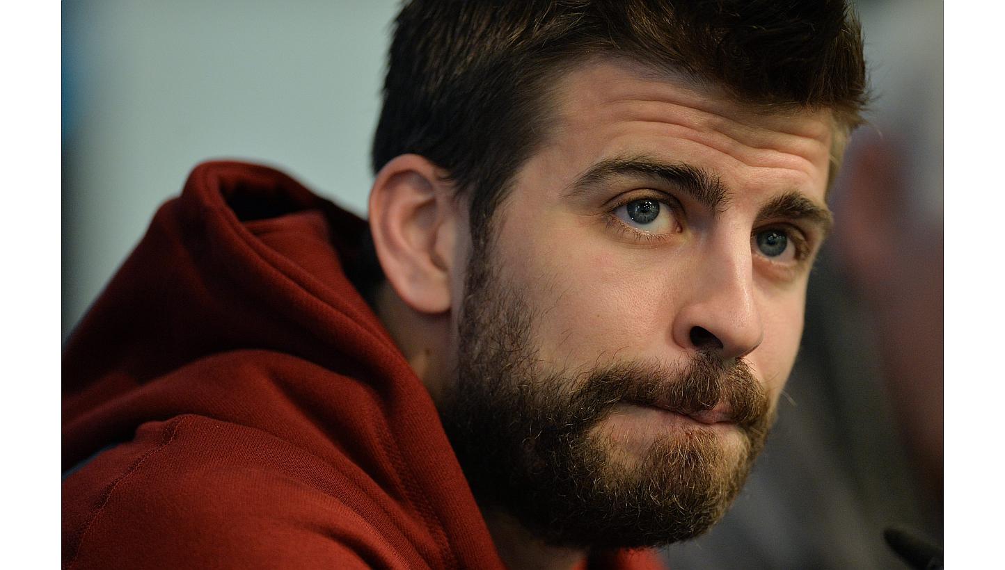 A Spanish judge hit Barcelona star Gerard Pique (above) with a heavy fine after the 2010 World Cup winner lost his temper and insulted two traffic policemen. -- PHOTO: EPA
