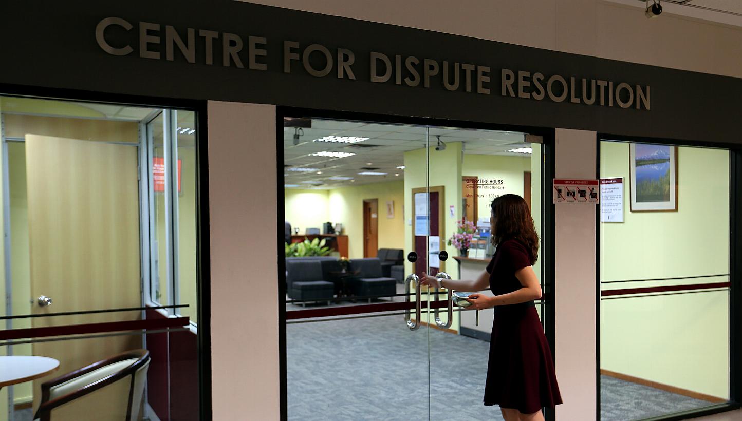 A new centre to encourage people to settle their disputes outside of a lengthy and costly trial was launched by Chief Justice Sundaresh Menon at the State Courts on Wednesday. -- ST PHOTO: WONG KWAI CHOW