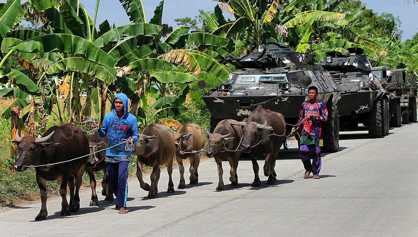 About 45,000 people have fled their homes in the impoverished southern Philippines as the military hunts Islamic militants, including a top terror suspect wanted by the United States, authorities said on Wednesday. -- PHOTO: AFP