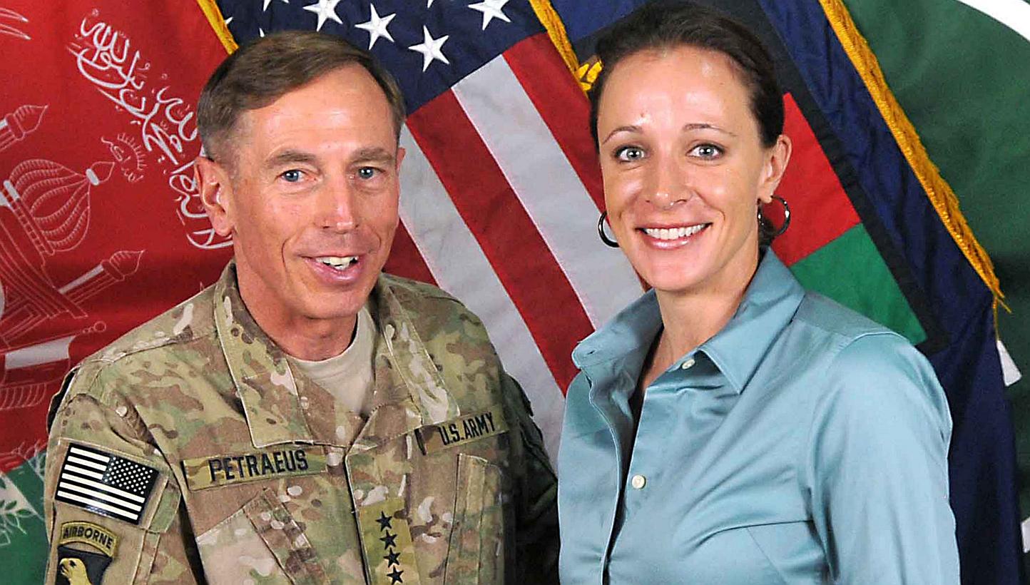 US Gen David Petraeus poses with his biographer Paula Broadwell in Afghanistan in 2011. -- PHOTO: AFP&nbsp;