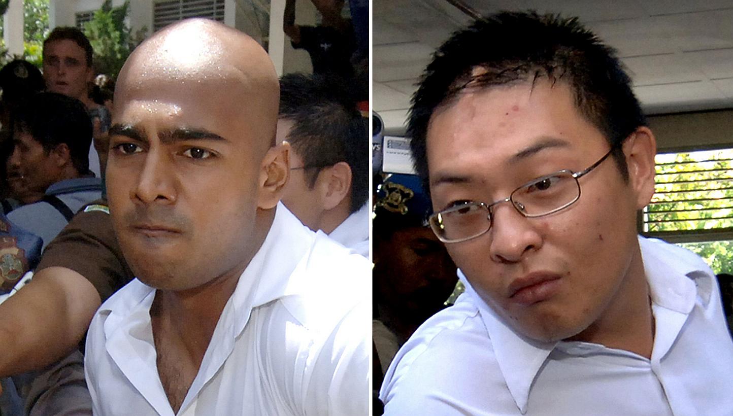 This combo shows file photos of Australian's Myuran Sukumaran (left) and Andrew Chan (right), the two ringleaders of the Bali Nine drug syndicate, being escorted out of a court after their verdict in Denpasar on Bali island on Feb 14, 2006. -- PHOTO: