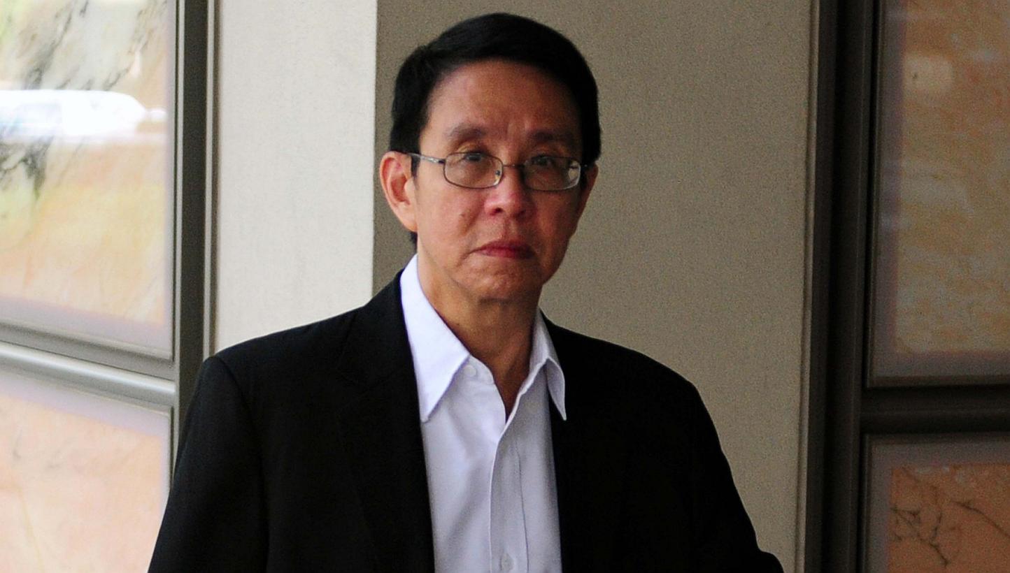 Blogger Alex Au, 62, arrives at the High Court in Singapore on March 5, 2015. -- PHOTO: AFP
