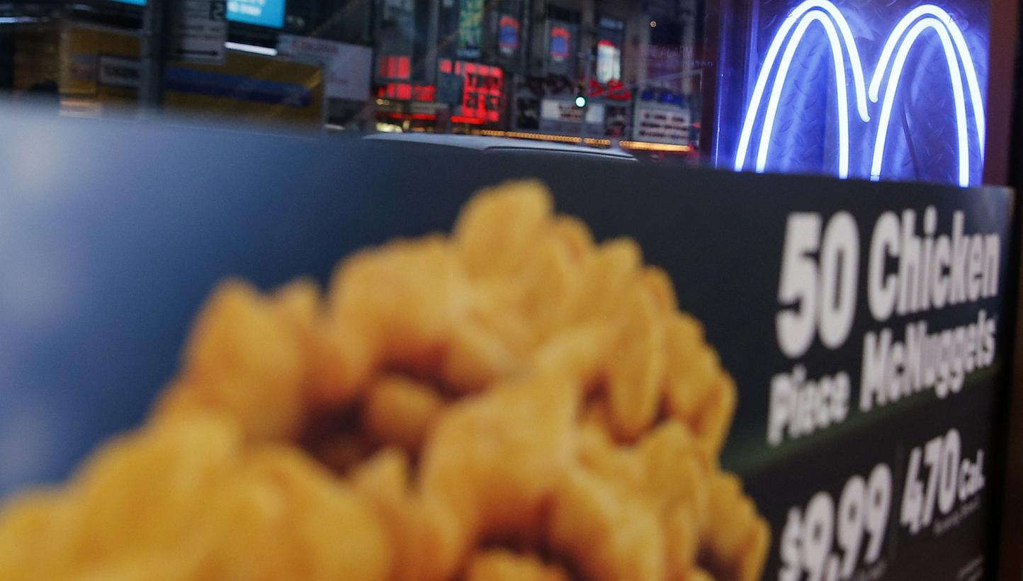 McDonald's Golden Arches are seen at the Times Square location in New York. McDonald's Corp's American restaurants will gradually stop buying chicken raised with antibiotics vital to fighting human infections. -- PHOTO: REUTERS&nbsp;