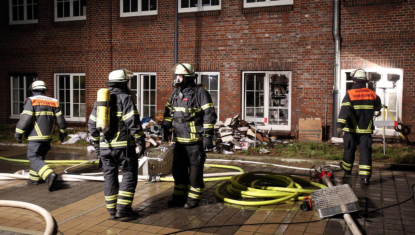 Firefighters outside German regional newspaper Hamburger Morgenpost in Hamburg, northern Germany, on Jan 11, 2015, following an arson attack.&nbsp;German police on Wednesday temporarily detained nine suspects over a January arson attack on a newspape