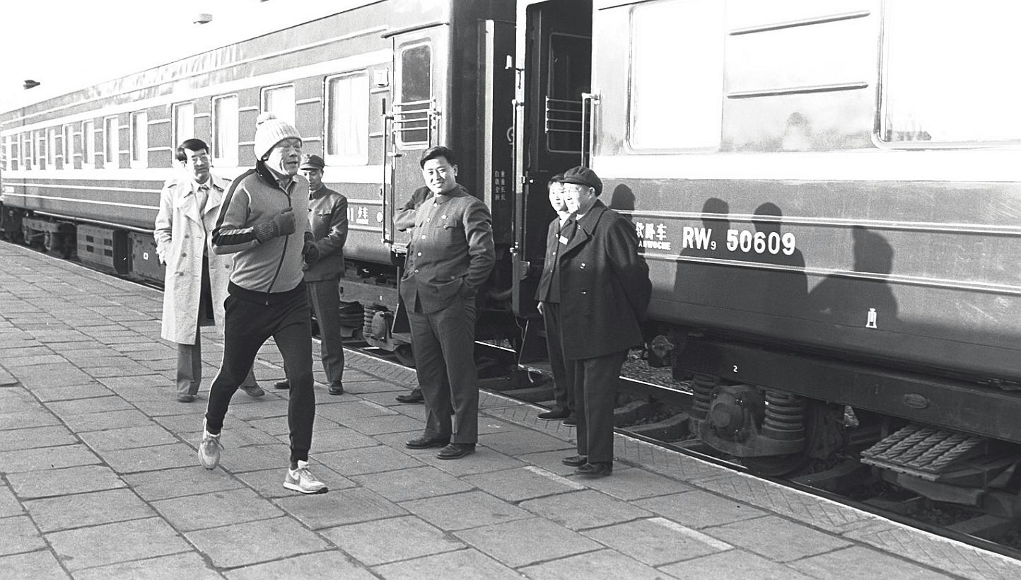 Mr Lee running in Chengde, China, in 1980. He turned to running after a surgeon friend told him that pushing the heart to its limits for as long as possible would improve heart muscle tone and get rid of the feeling of lethargy. -- ST FILE PHOTO