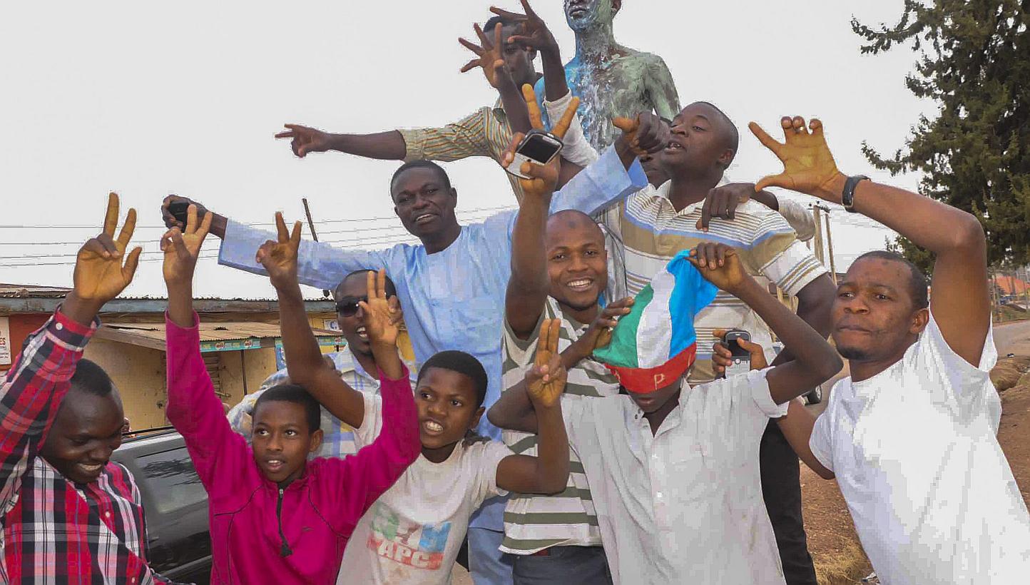Nigerians celebrating the victory of Mr Muhammadu Buhari in Jos, Nigeria, on March 31, 2015, at the presidential election. -- PHOTO: EPA