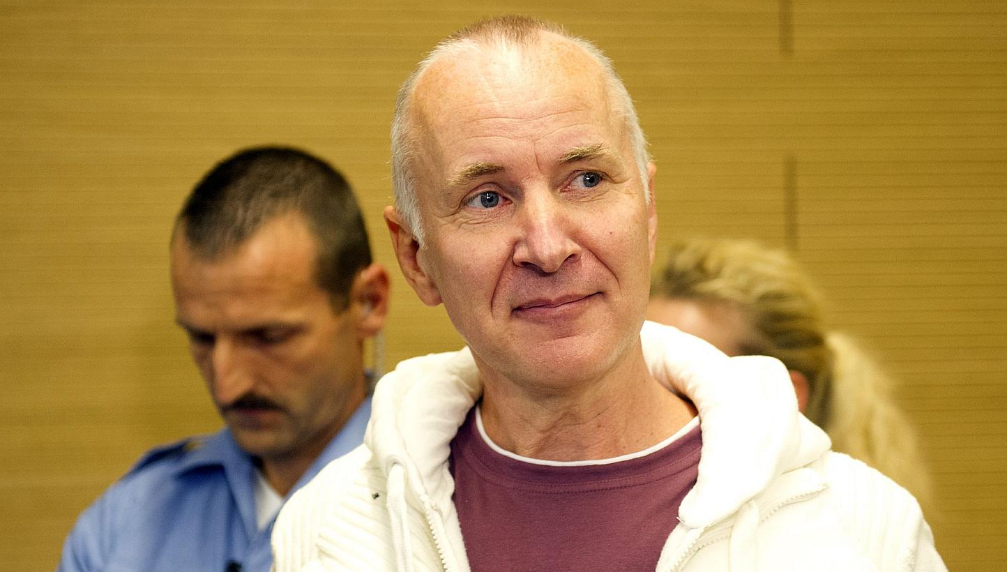 Detlev Guenzel (right) arriving for the opening of his trial at the court in Dresden, eastern Germany. Guenzel was sentenced to eight years and six months in jail on Wednesday for killing a willing victim he met on a website for cannibalism fetishist