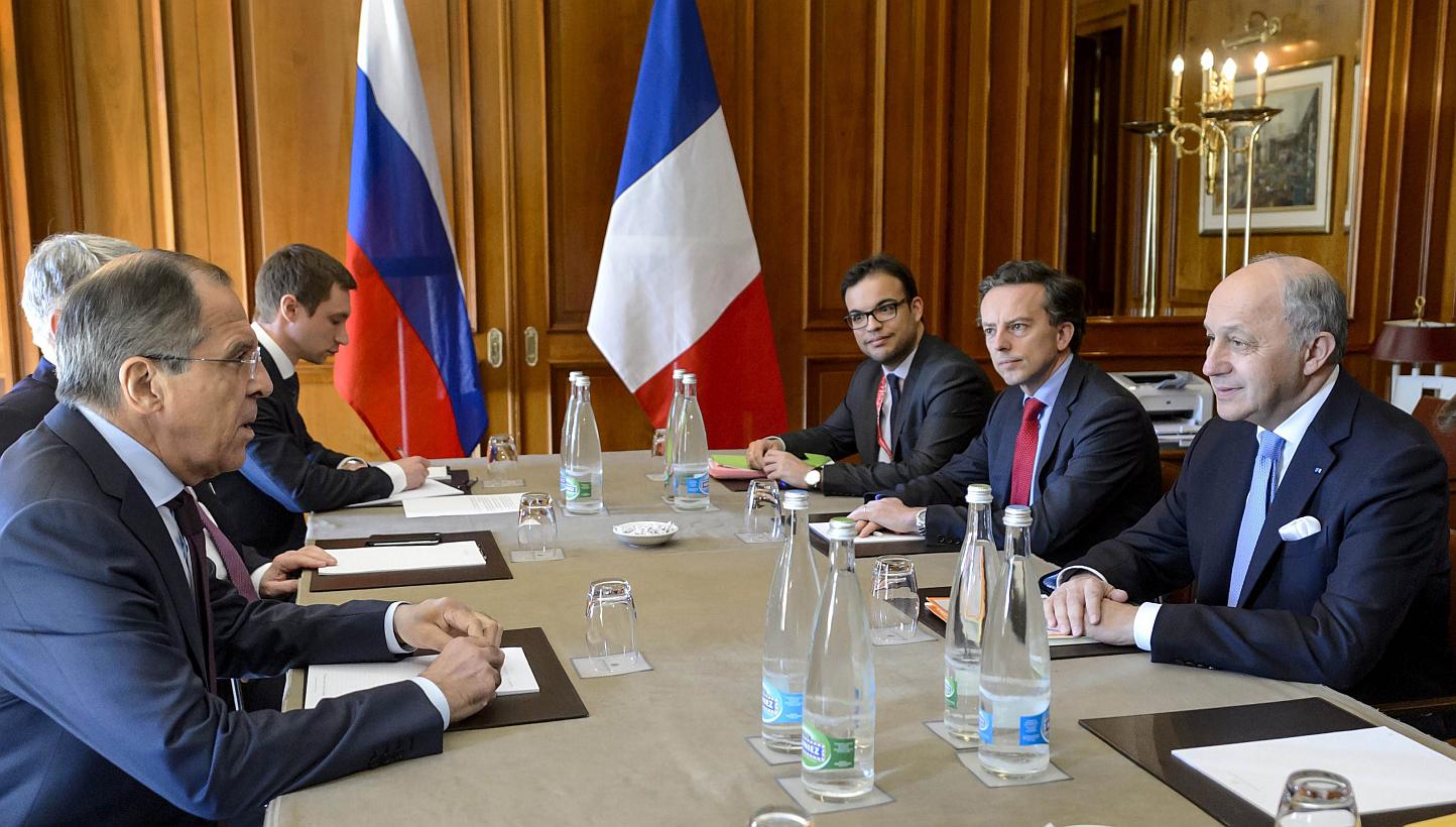 French Foreign Minister Laurent Fabius (right) speaking with his Russian counterpart Sergei Lavrov (left) and their delegations during Iran nuclear talks, on March 30, 2015. Mr Fabius&nbsp;said on Wednesday, April 1, that talks between Iran and world