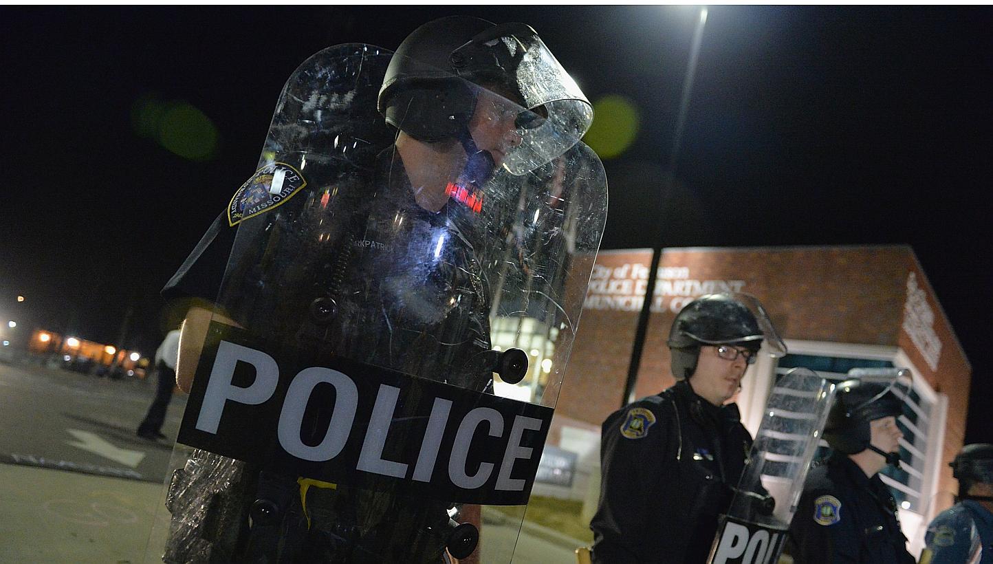 4 journalists file US lawsuit against Ferguson police over battery ...