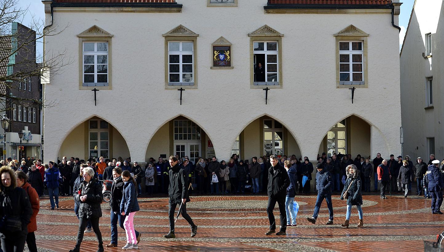People gather for a mourning service in front of the church St Sixtus in Haltern am See, western Germany on April 1, 2015, from where some of the Germanwings plane crash victims came. The small German town of Haltern am See on Wednesday held an emoti