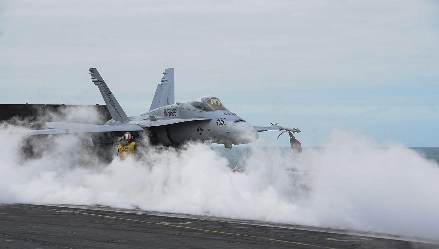 An F/A-18C Hornet prepares to launch from the flight deck of the USS Theodore Roosevelt (CVN 71) on March 22, 2015.&nbsp;China's Foreign Ministry expressed anger on Thursday after two US F-18 fighter jets landed in Taiwan, in a rare official contact 