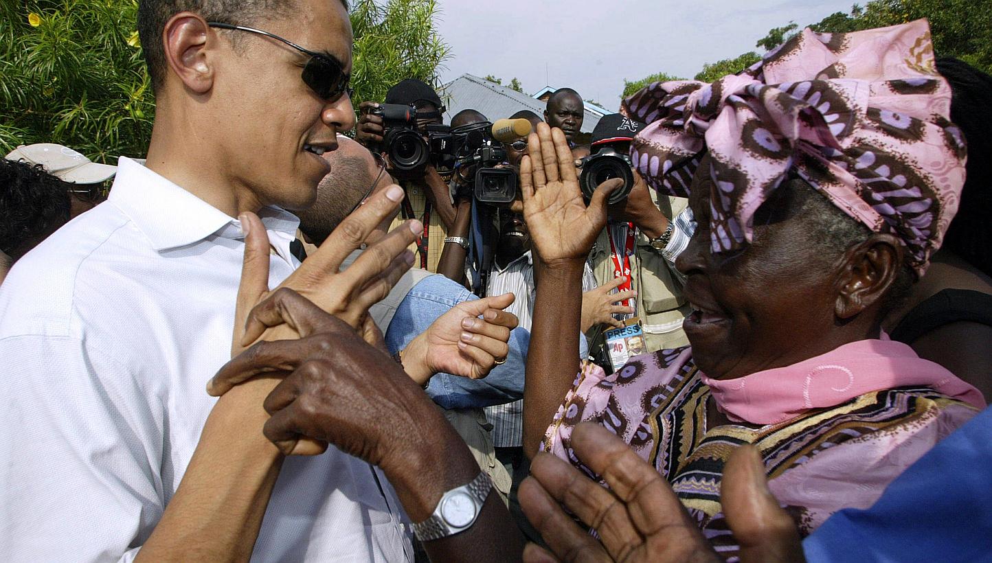 In this Aug 26, 2006 file photo, then US senator Barack Obama greets his grandmother Sarah Obama at their rural home in Siaya, Kisumu, 365km west of the capital Nairobi. US President Obama's Kenyan grandmother has welcomed his planned visit to t