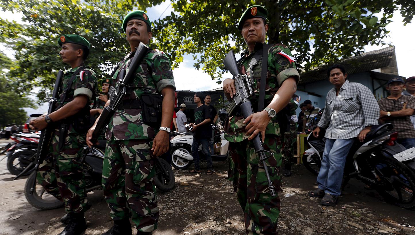 Indonesian soldiers stand as guard at Wijayapura port near the prison island of Nusa Kambangan in Cilacap, Central Java island, Indonesia, on April 27, 2015. -- PHOTO: REUTERS
