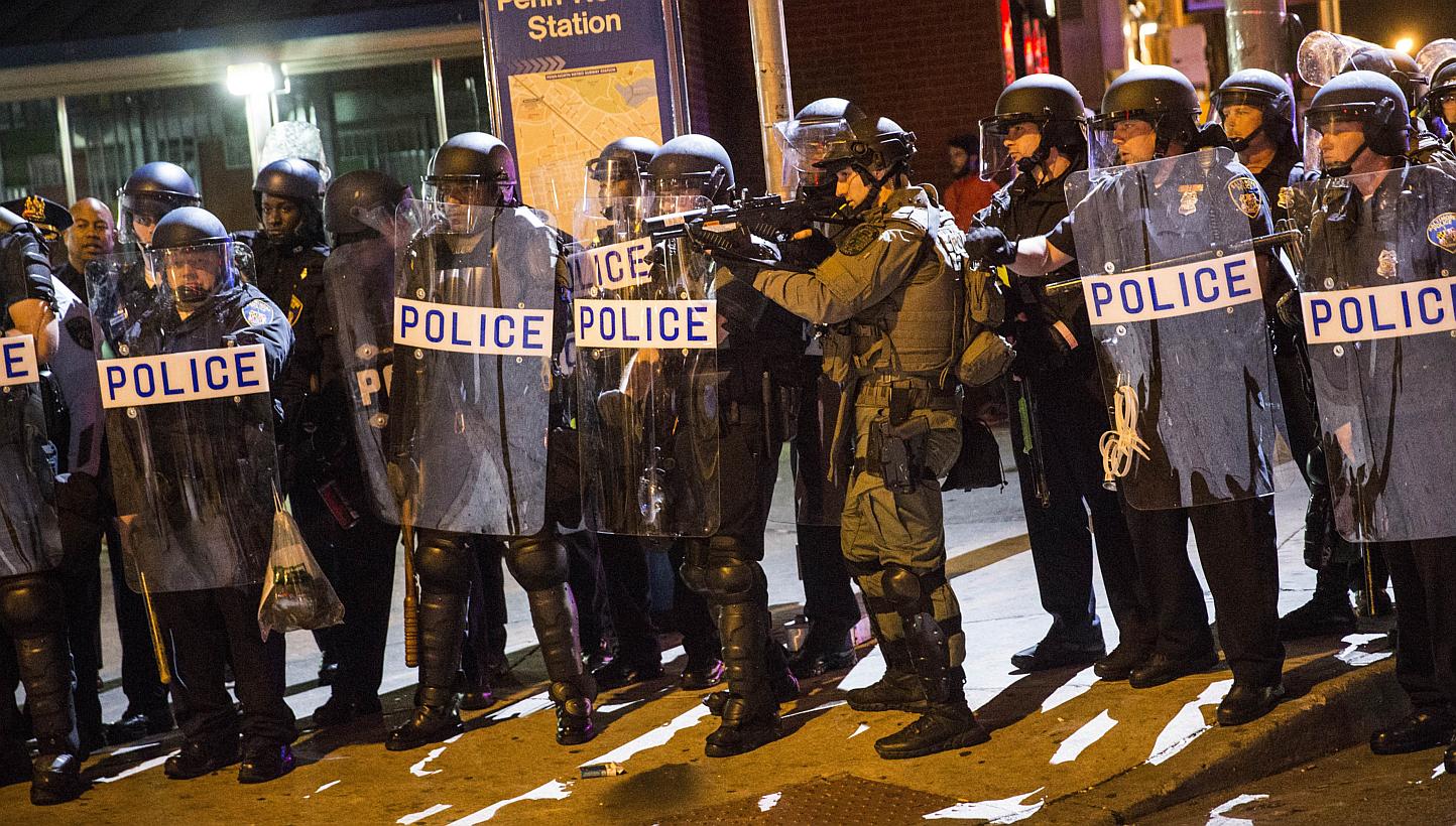 Riot police advancing on protesters and media during protests in the Sandtown neighbourhood where Freddie Gray was arrested on April 30, 2015, in Baltimore, Maryland. -- PHOTO: AFP&nbsp;