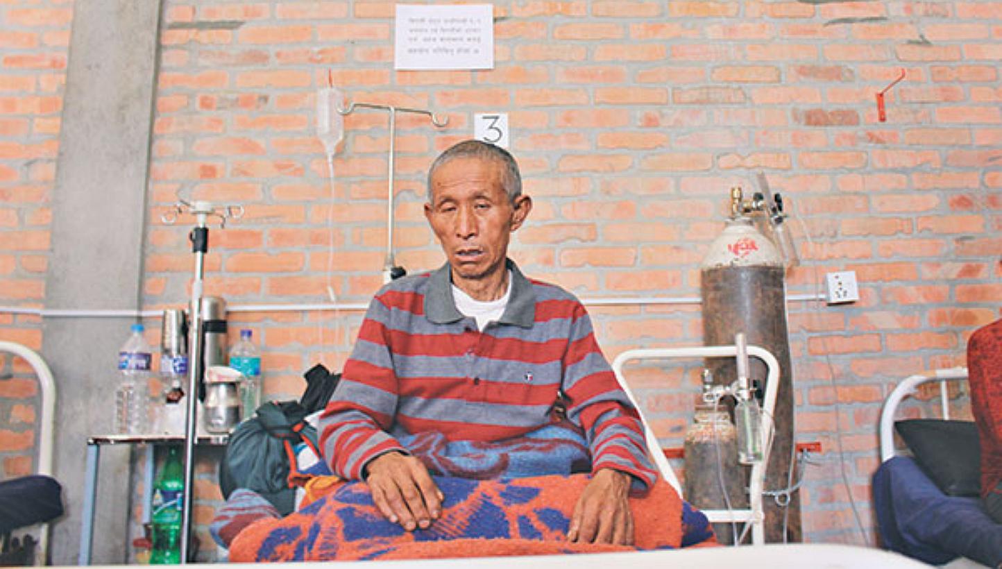 67-year-old Dal Ram Ghale of Barpak village of Gorkha, the epicentre of the earthquake, recuperating at Gorkha District Hospital. -- PHOTO: THE KATHMANDU POST/ ASIA NEWS NETWORK&nbsp;