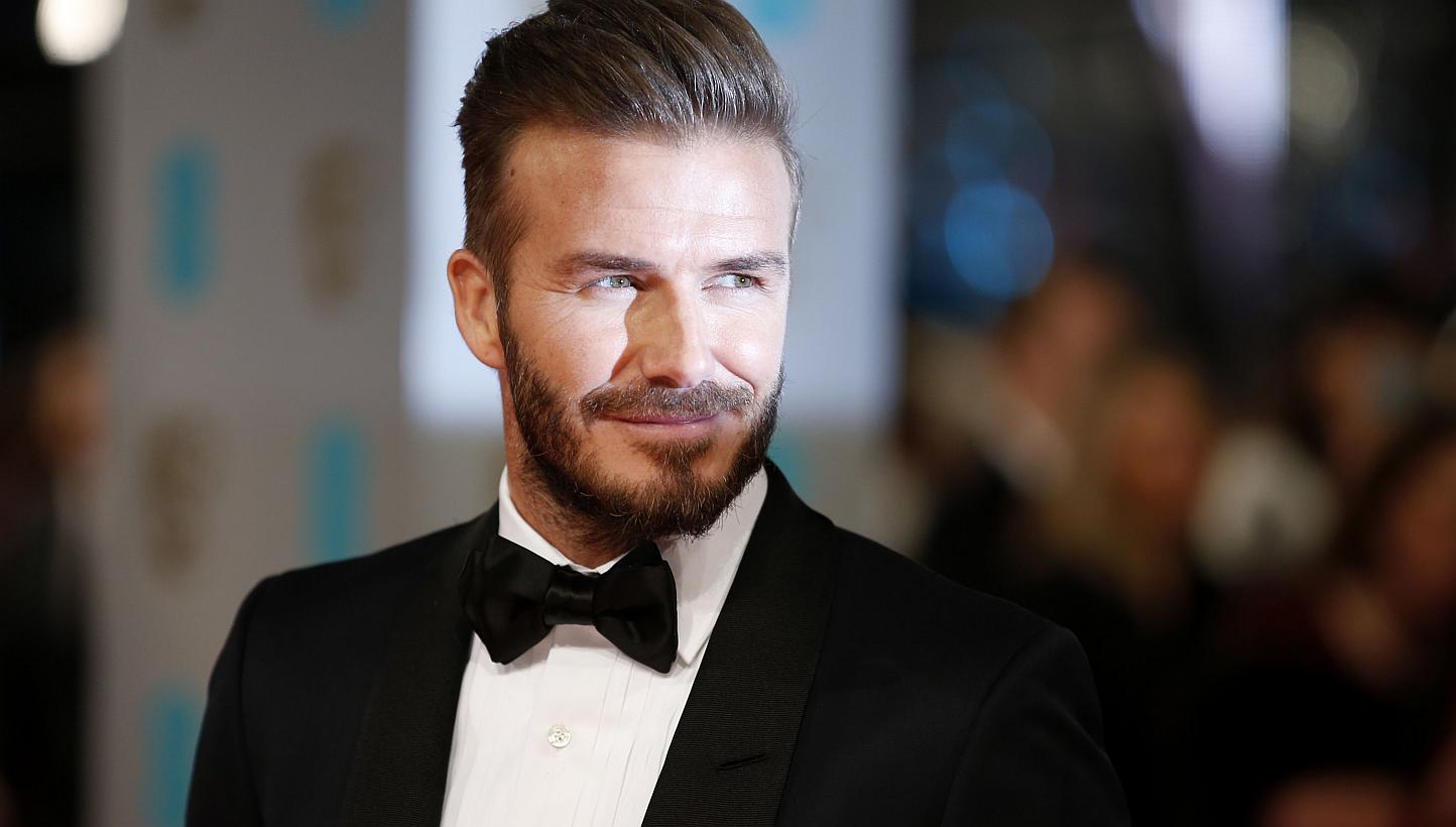 David Beckham (above, in February) will celebrate his 40th birthday on Saturday with a star-studded bash in Morocco as the Manchester United and England legend shows retirement has done little to diminish his love of the limelight. -- PHOTO: AFP