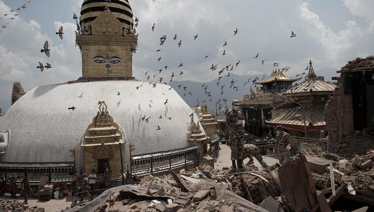This picture taken on May 2, 2015, shows Nepalese soldiers clearing rubble of a building at the damaged Swayambhunath temple in Kathmandu, following a 7.8 magnitude earthquake which struck the Himalayan nation on April 25, 2015. -- PHOTO: AFP