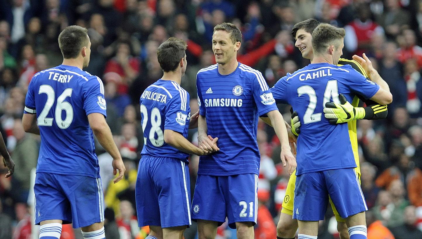 Chelsea players celebrate at the end of the English Premier League match against Arsenal at The Emirates Stadium, in London, on April 26, 2015. Chelsea only need to get three more points for them to win the EPL crown. -- PHOTO: EPA