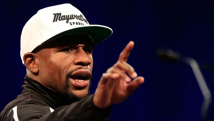 Floyd Mayweather has shrugged off the jeers which greeted his victory over Manny Pacquiao and wasted no time in taunting his detractors. -- PHOTO: AFP
