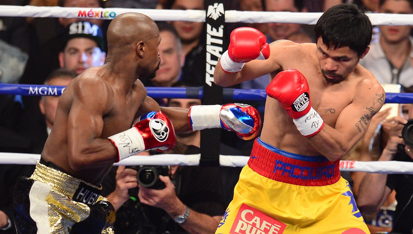 Boxer and politician Manny Pacquiao, 36, is expected to donate half of his earnings from Saturday's boxing match with Floyd Mayweather Jr to charity. --PHOTO: AFP