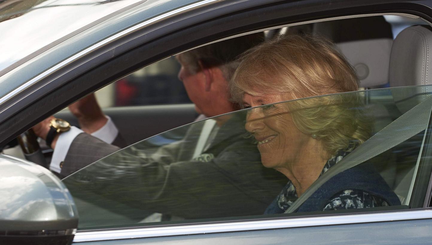 Britain's Prince Charles and wife Camilla, Duchess of Cornwall leave Kensington Palace on Sunday in London after visiting Prince William and wife Kate following the birth of their daughter. -- PHOTO: AFPAFP