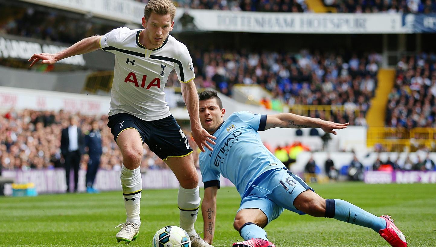Tottenham's Jan Vertonghen in action with Manchester City's Sergio Aguero on Sunday. -- PHOTO: REUTERS