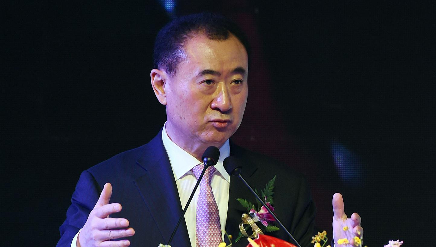 Wang Jianlin, chairman of Wanda Group, speaks at a ceremony in Beijing on Feb 10, 2015. -- PHOTO: AFP