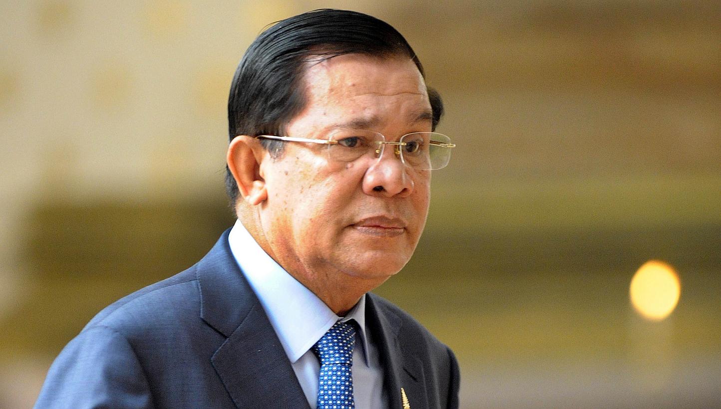 Hun Sen said he had made a US$5,000 bet with an official on the match outcome, a bet he would no longer honour.-- PHOTO: AFP&nbsp;