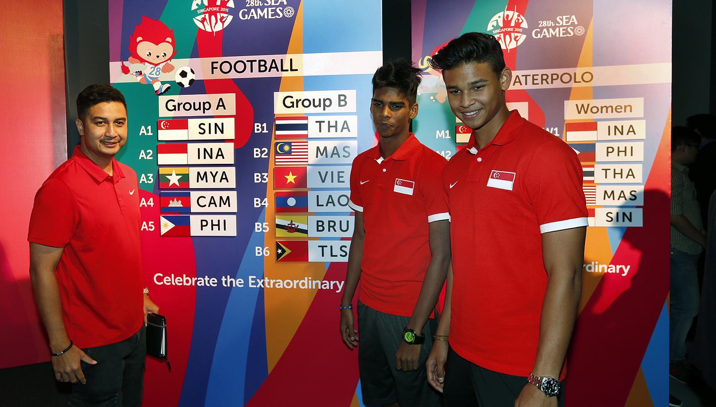 (From left) National Under-23 coach Aide Iskandar with players Iqbal Hussain and Irfan Fandi at the draw conducted on 15 April 2015 for the June SEA Games. The Lions will begin their SEA Games football campaign on June 1 against the Philippines. -- S