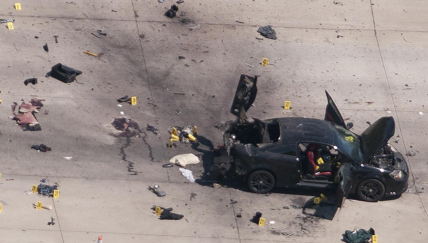 An aerial view shows the car that was used the previous night by two gunmen, who were killed by police, as it is investigated by local police and the FBI in Garland, Texas on Monday. -- PHOTO: REUTERS