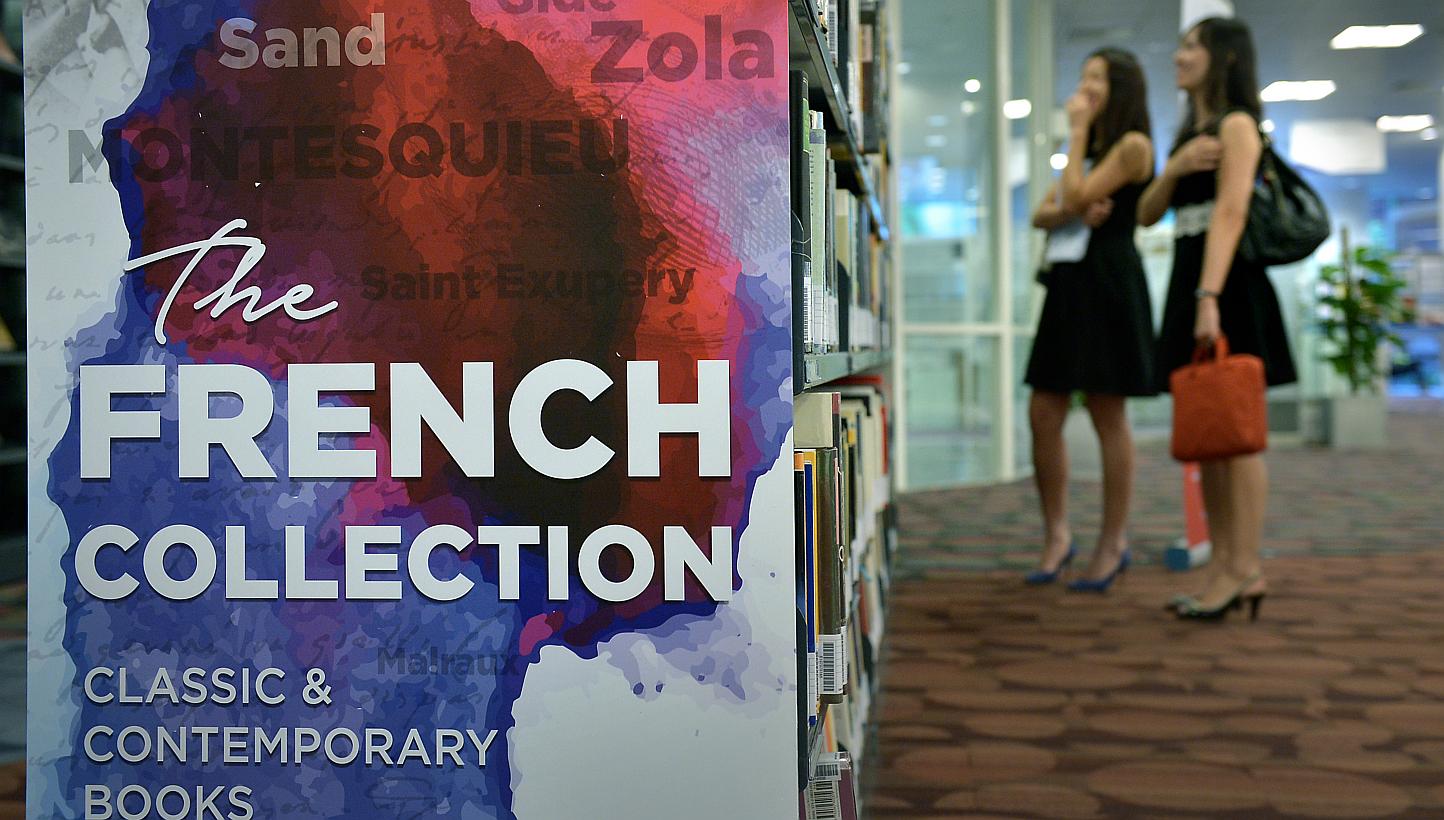 The public will now be able to borrow from the National Library Board's (NLB) collection of more than 1,000 French books, previously available for reference only. -- ST PHOTO: KUA CHEE SIONG