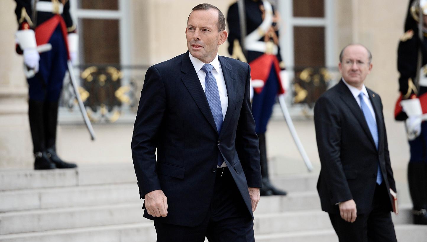 Australian Prime Minister Tony Abbott leaves the Elysee Palace in Paris after a meeting with France's President on April 27, 2015. Mr Abbott said on Wednesday that he was unaware the gay partner of his ambassador to France was asked "to wait in the c