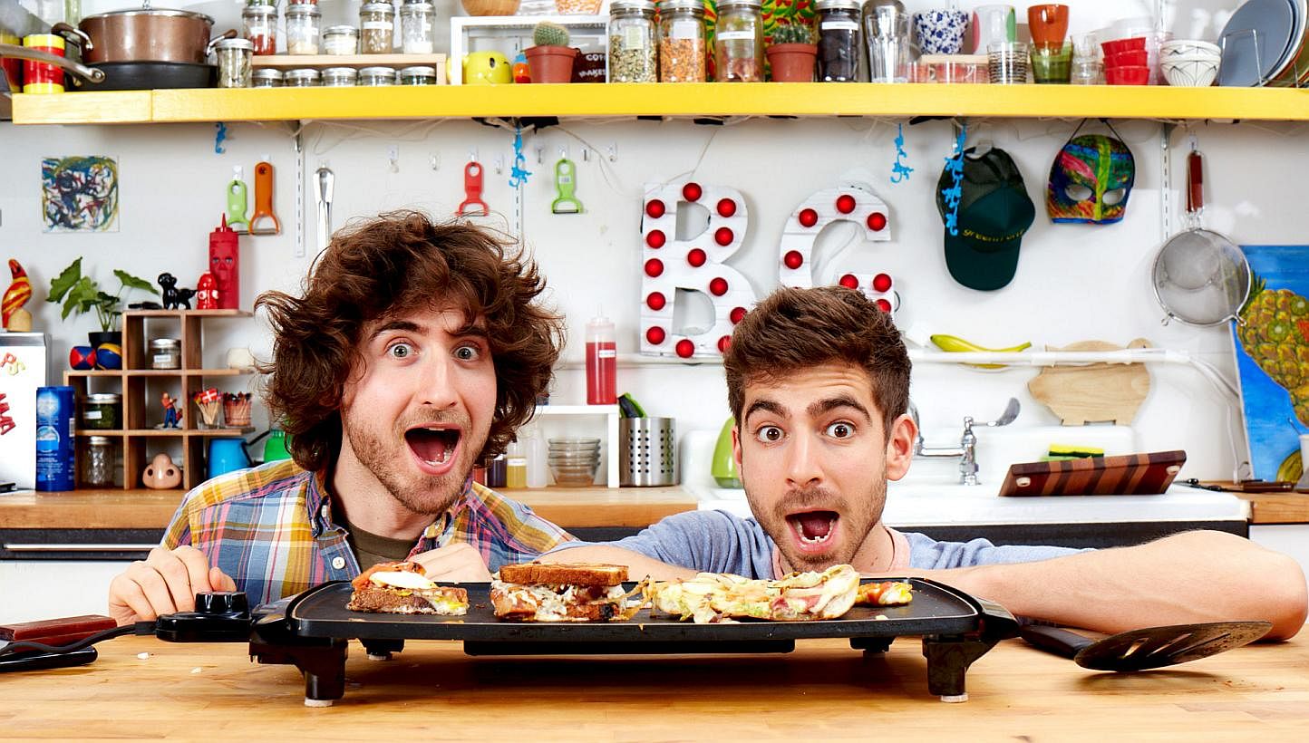 Josh (far left) and Mike Greenfield got their new TV show after their tutorial videos of easy-to-cook meals on YouTube caught the attention of a production house.