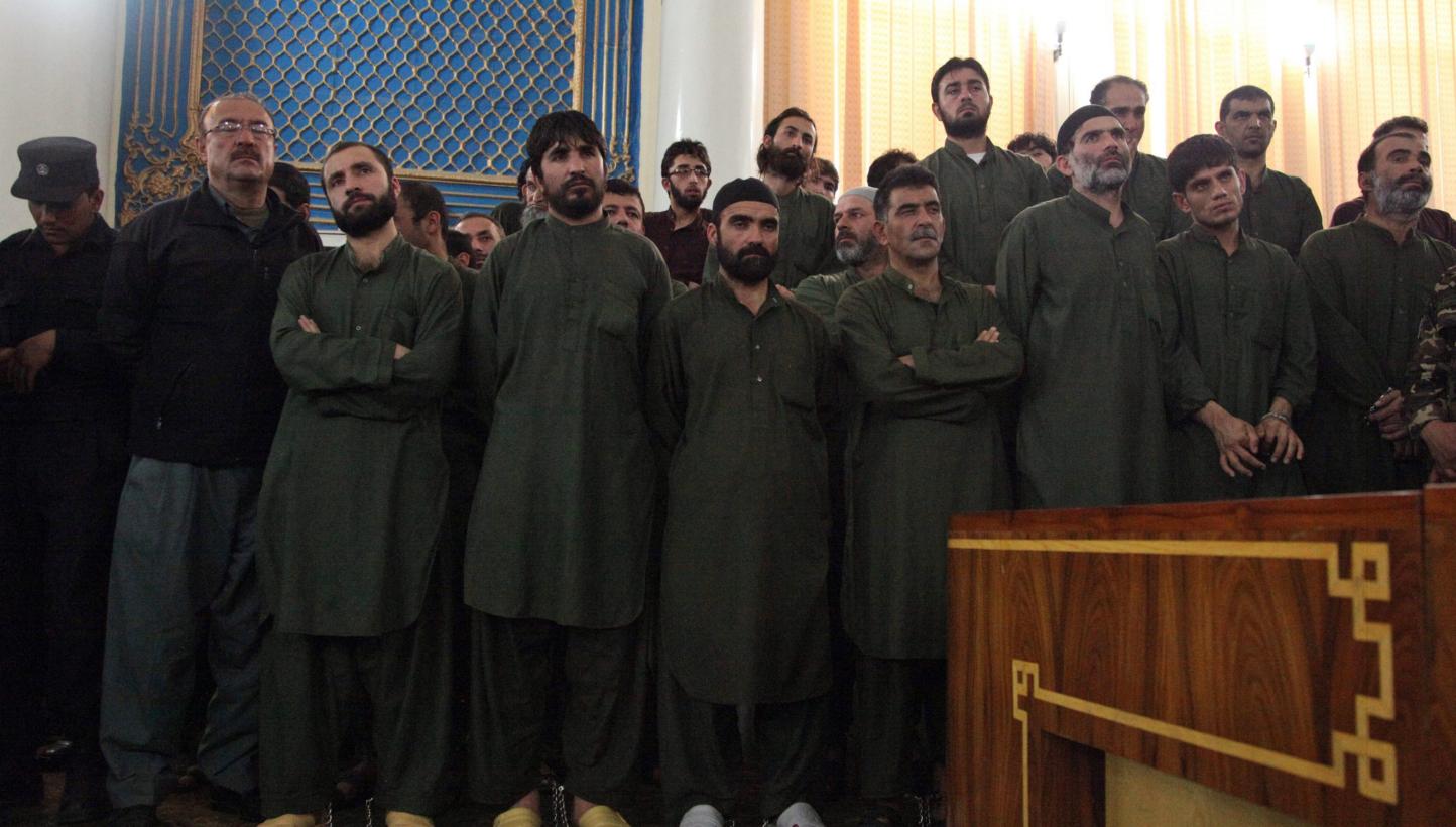 The four were among 49 defendants, 19 of them police officers, on trial in connection with the killing of 27-year-old woman accused of burning a Quran in Kabul. -- PHOTO: EPA&nbsp;