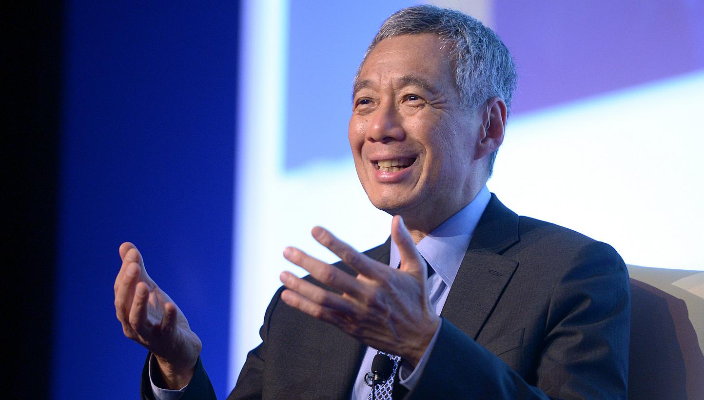 PM Lee has been commended for being "cool", "awesome" and "amazing" after posting on Facebook a source code he created to solve sudoku puzzles. -- ST PHOTO: LIM SIN THAI 