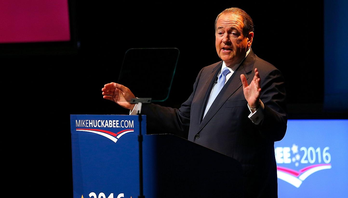 Former Arkansas Gov. Mike Huckabee speaks as he officially announces his candidacy for the 2016 Presidential race on Tuesday in Hope, Arkansas. Huckabee, a Republican, previously ran for the presidency in 2008. -- PHOTO: AFP