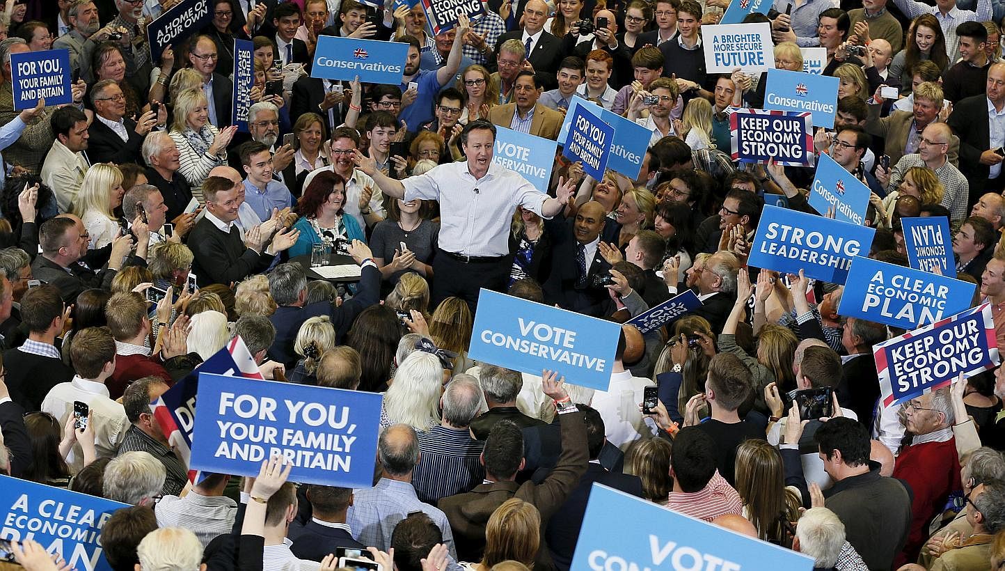 Britain's Prime Minister David Cameron delivers an election speech at the Hayesfield Girls' School in Bath, western England, Britain on May 4, 2015. -- PHOTO: REUTERS&nbsp;