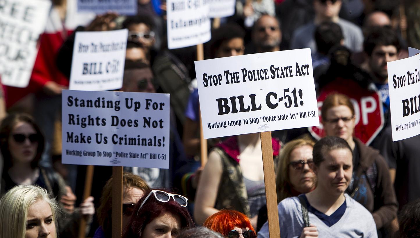 Protesters demonstrating against Bill C-51, Canada's proposed anti-terrorism legislation, in Vancouver on April 18, 2015. Lawmakers passed the bitterly opposed law on Wednesday, dramatically expanding the powers and reach of Canada's spy agency. -- P