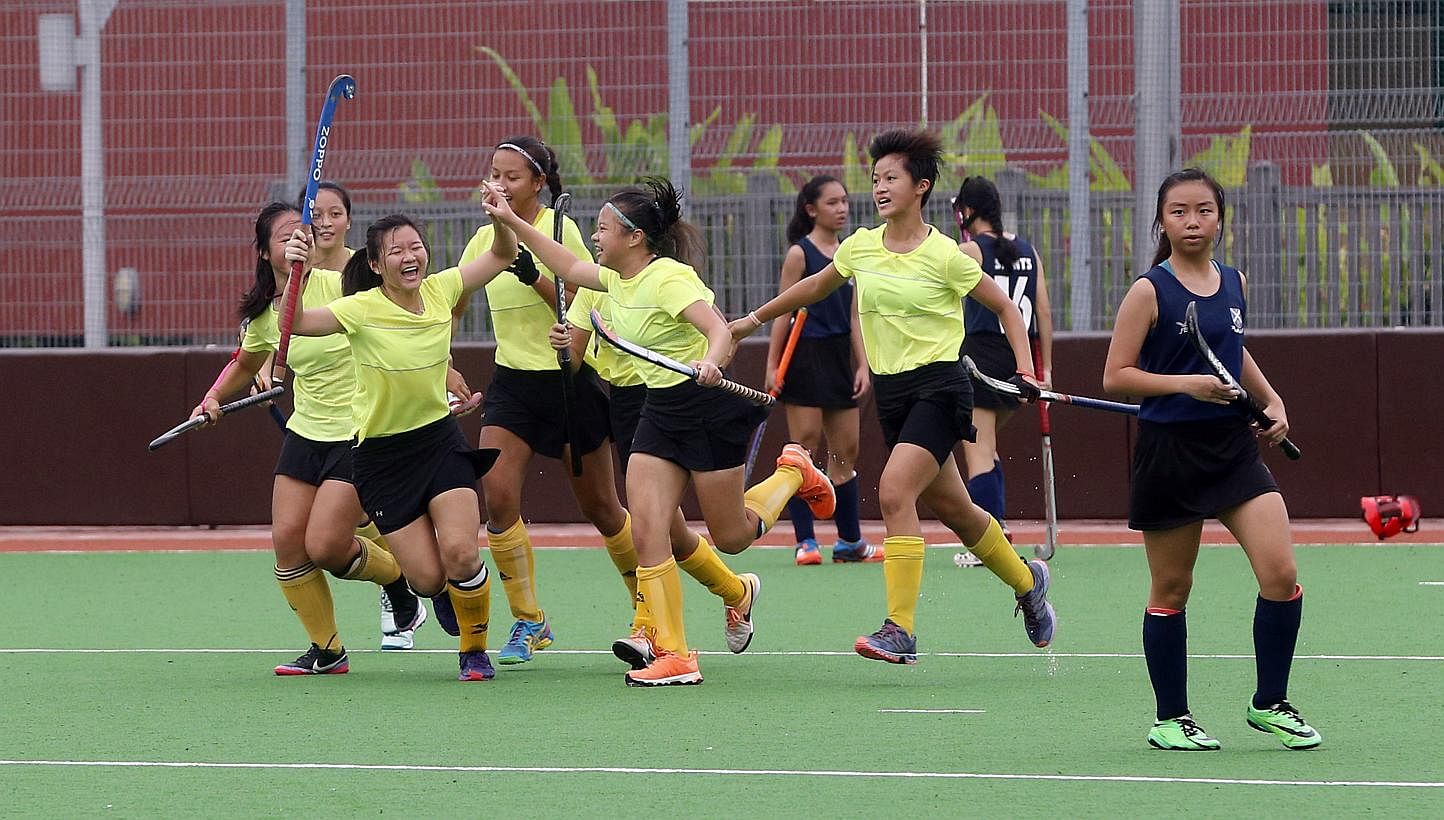 THE Victoria Junior College (VJC) girls' hockey team bagged their 13th consecutive Schools National A Division title on Thursday afternoon, defeating St Andrew's Junior College (SAJC) 3-0. -- ST PHOTO:&nbsp;CHEW SENG KIM