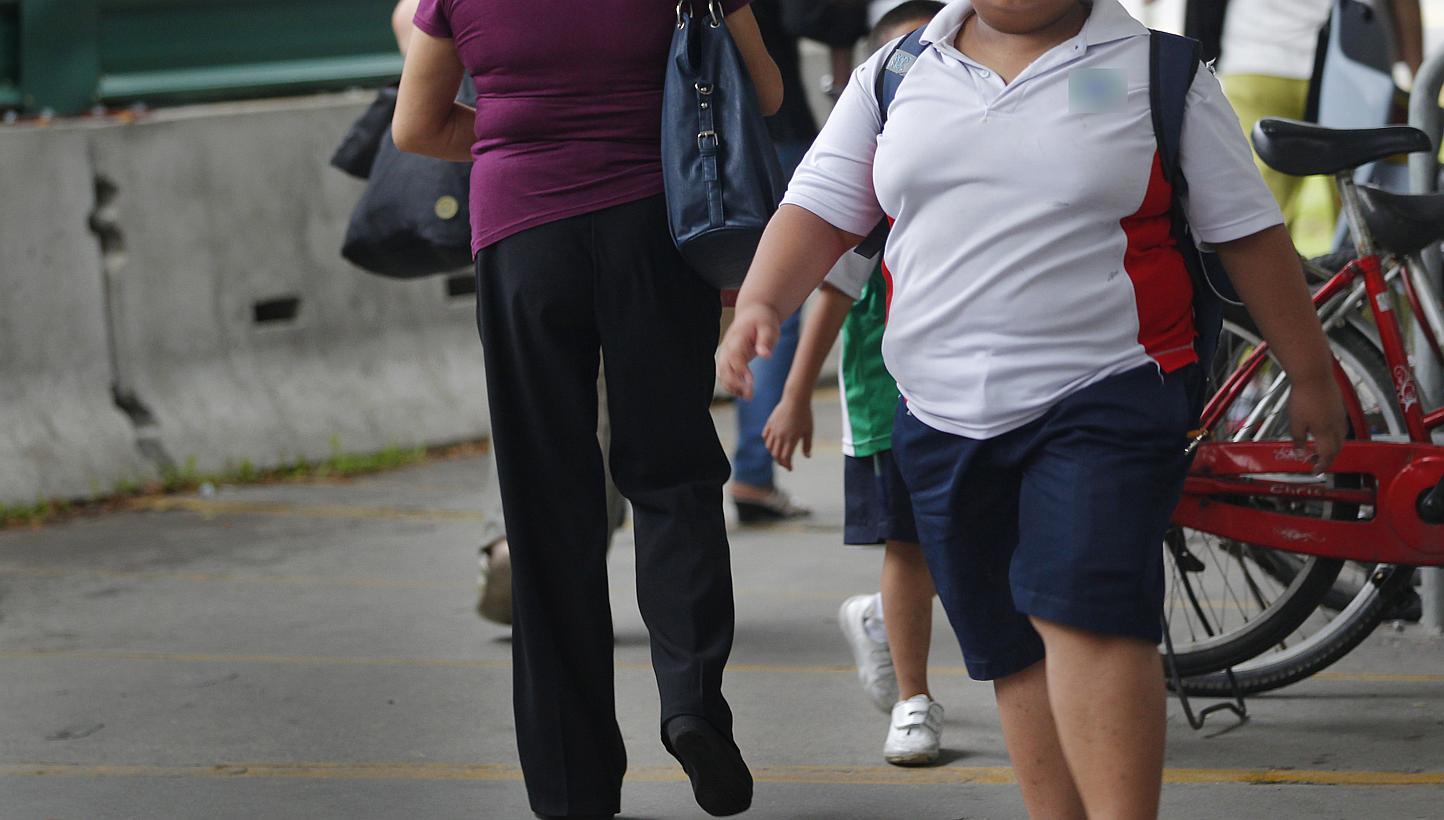 Obese children are far less likely to finish school than peers of normal weight, according to European research on Thursday that also highlighted body image problems in children as young as six. --&nbsp;PHOTO: ST FILE
