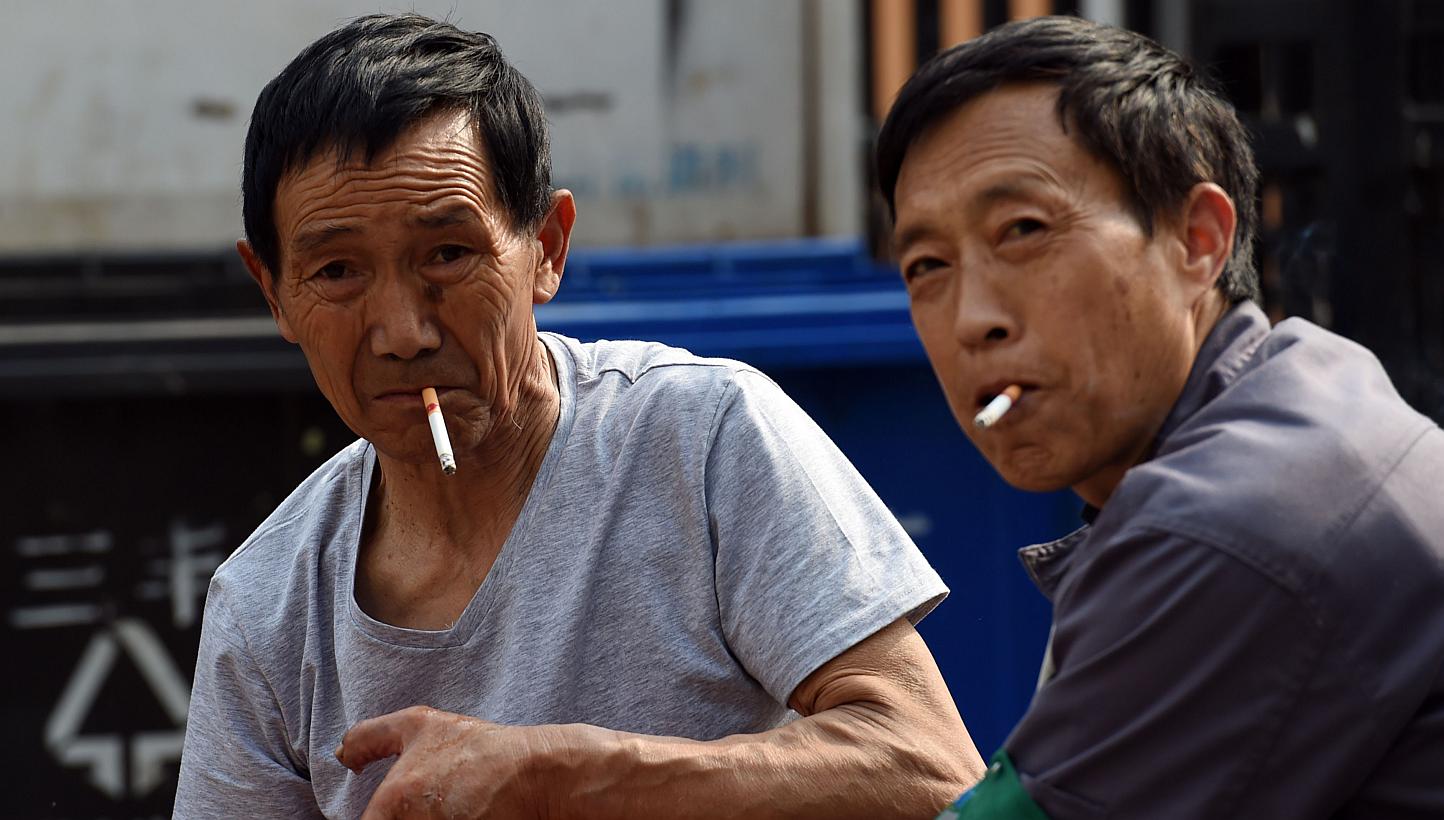 Individual cigarettes will be taxed an additional 0.005 yuan each, the Ministry of Finance said in a statement. It said the changes will take effect May 10, 2015. -- PHOTO: AFP