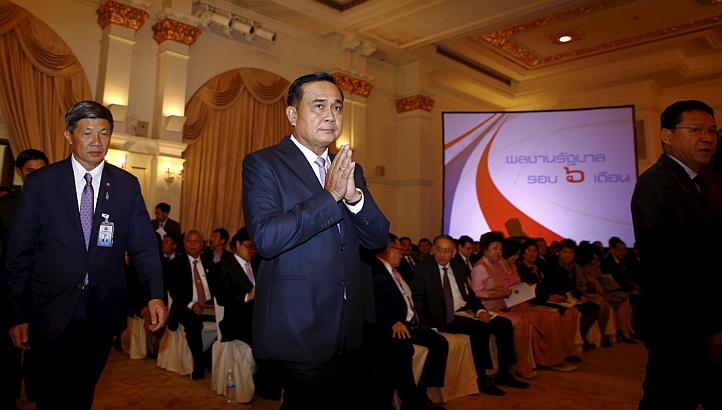 Thailand's Prime Minister Prayuth Chan-ocha on Friday called for a three-way meeting with neighbours Malaysia and Myanmar to try to resolve a regional human trafficking crisis following the discovery of a mass grave in the country's far south. -- PHO