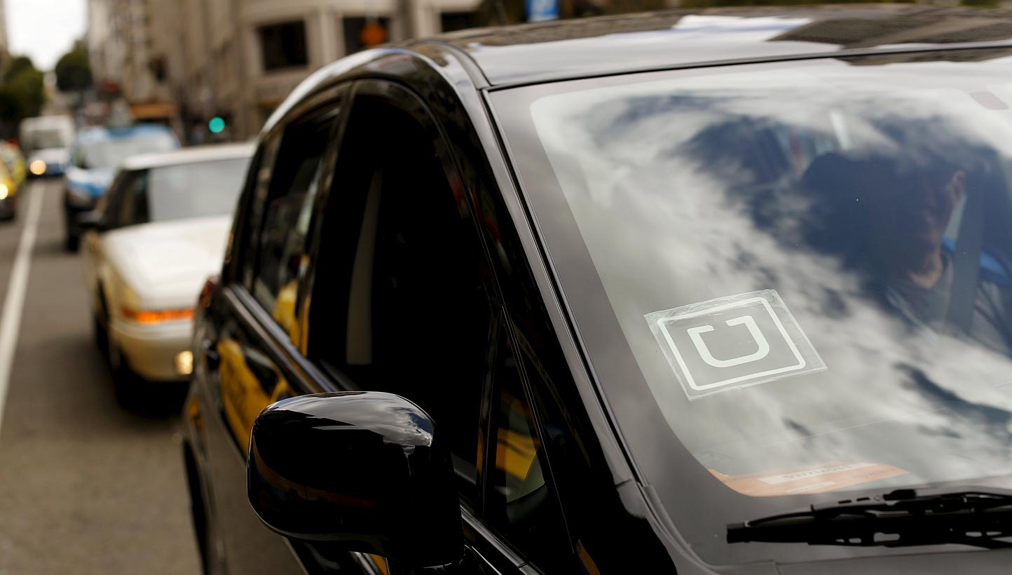 The Uber logo is seen on a vehicle near Union Square in San Francisco, California on May 7, 2015. -- PHOTO: REUTERS