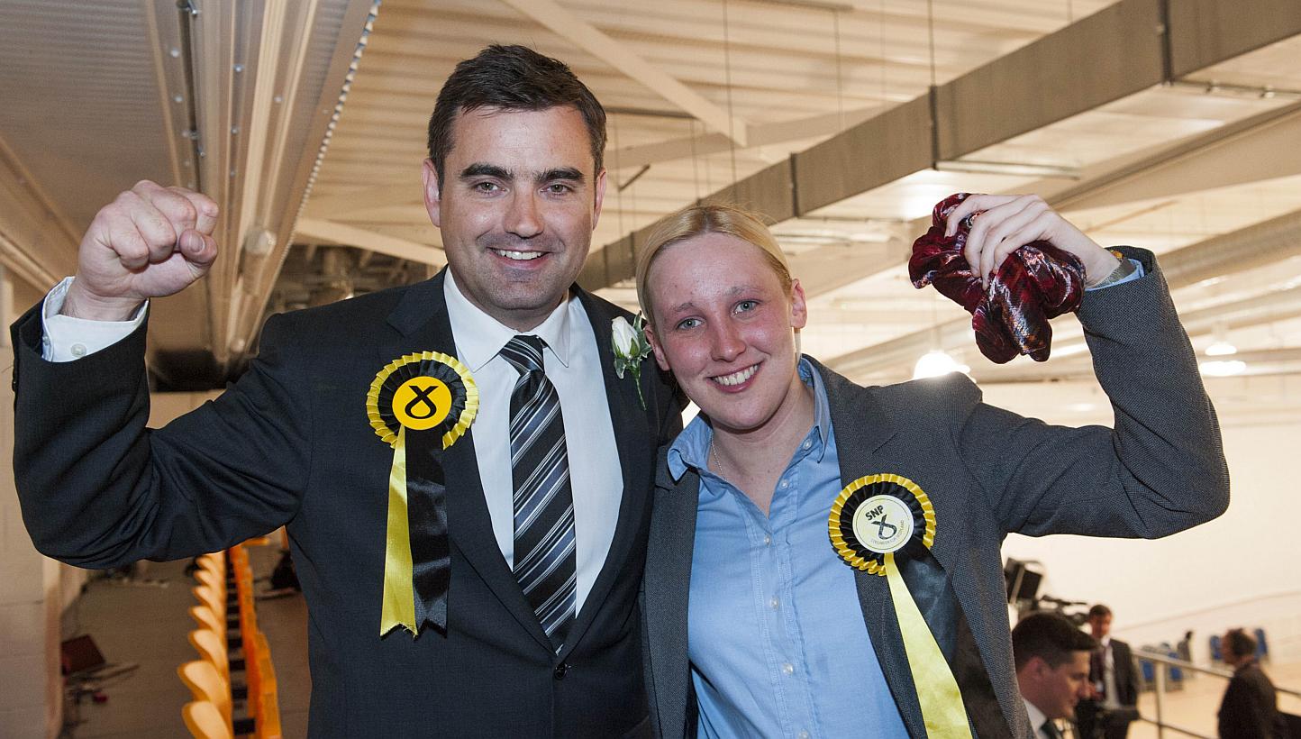 Scottish National Party (SNP) Member of Parliament Mhairi Black (right), Britain's youngest MP since 1667, with also newly elected SNP MP Gavin Newlands. -- PHOTO: AFP 