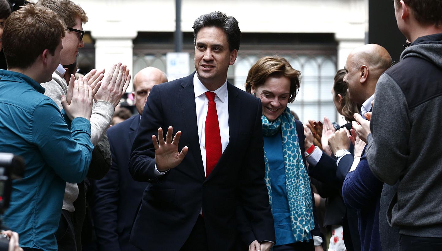 Labour Party leader Ed Miliband and his wife Justine Thornton arriving at Labour Party headquarters in London on May 8, 2015. -- PHOTO: AFP 