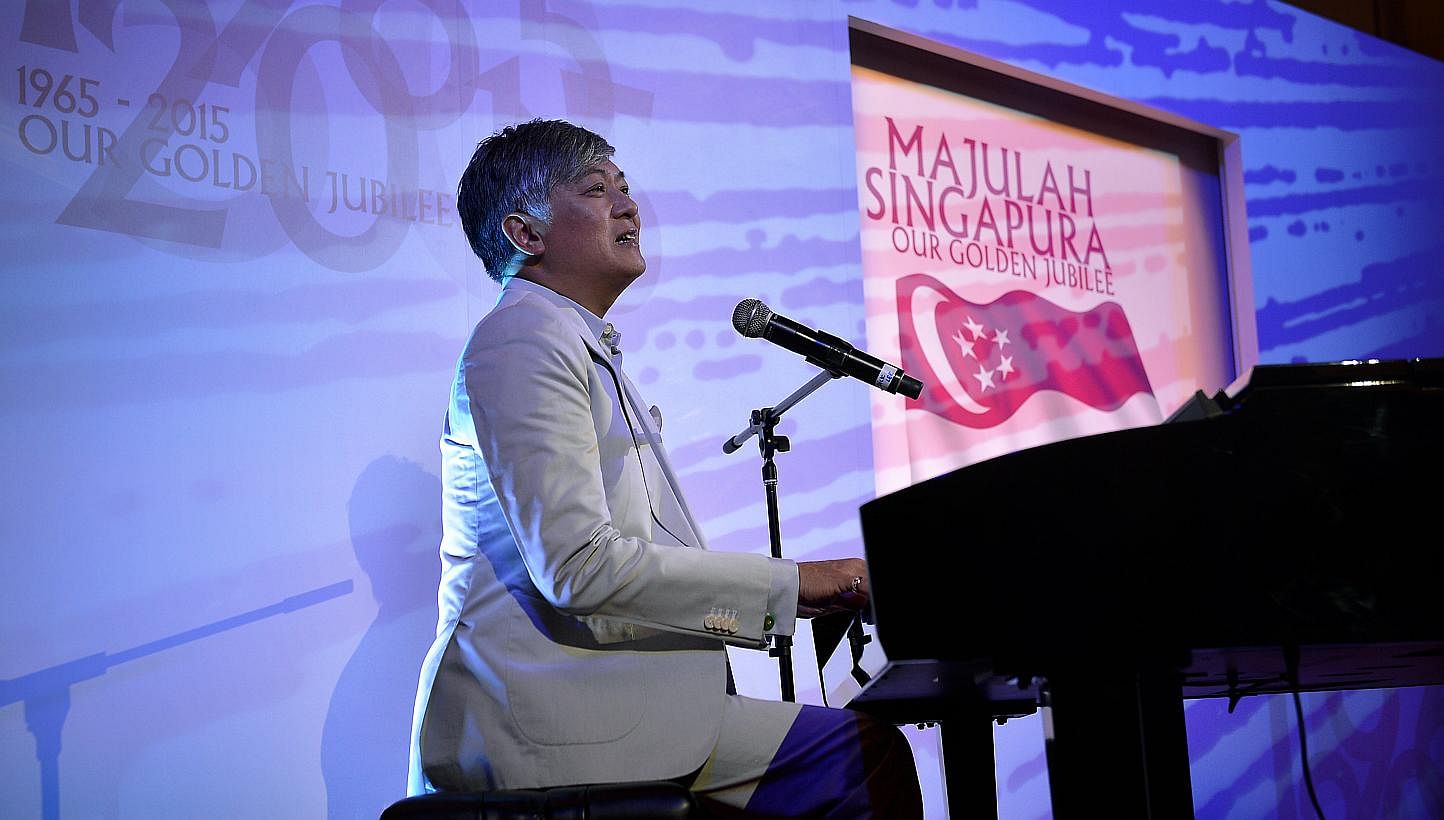 Composer Dick Lee performing this year's Golden Jubilee National Day song Our SIngapore when he unveiled it two days ago. -- ST PHOTO: KUA CHEE SIONG&nbsp;