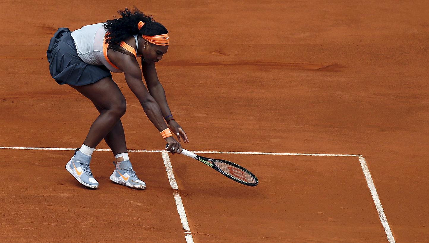 Serena Williams of the U.S. tries to return the ball to Petra Kvitova of the Czech Republic during their semi-final match at the Madrid Open tennis tournament in Madrid, Spain, May 8, 2015. -- PHOTO: REUTERS 