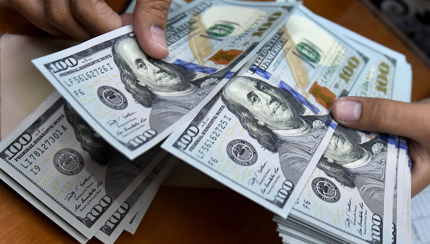 The dollar rose in Asian trade on fresh expectations the US central bank may raise interest rates in the second half of the year, analysts said. -- PHOTO: AFP