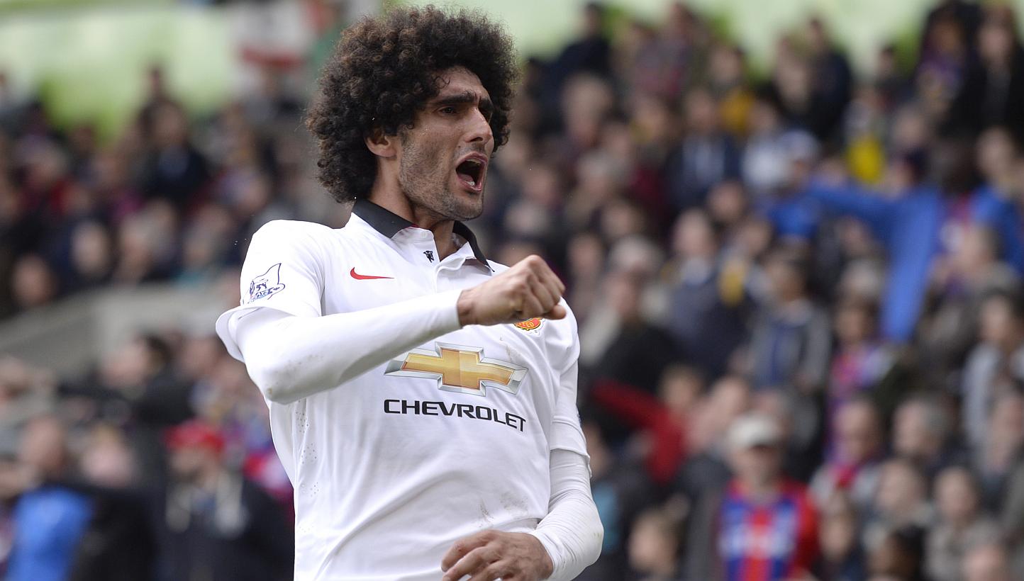 Manchester United's Marouane Fellaini celebrates scoring their second goal against Crystal Palace on May 10, 2015. -- PHOTO: REUTERS&nbsp;