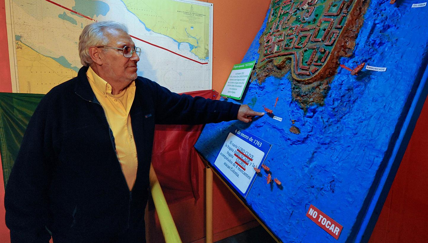 Treasure hunter Ruben Collado shows the place were the British 64-cannon ship Lord Clive was sunk in 1763, on April 29, 2010. Collado has announced the start of rescue works for the Lord Clive, which may have 100,000 gold coins in its hull. -- PHOTO: